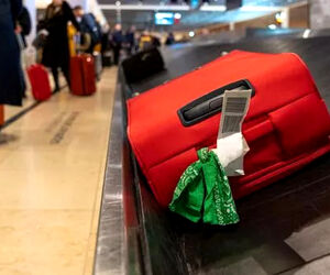 چرا نباید به چمدانتان روبان ببندید؟